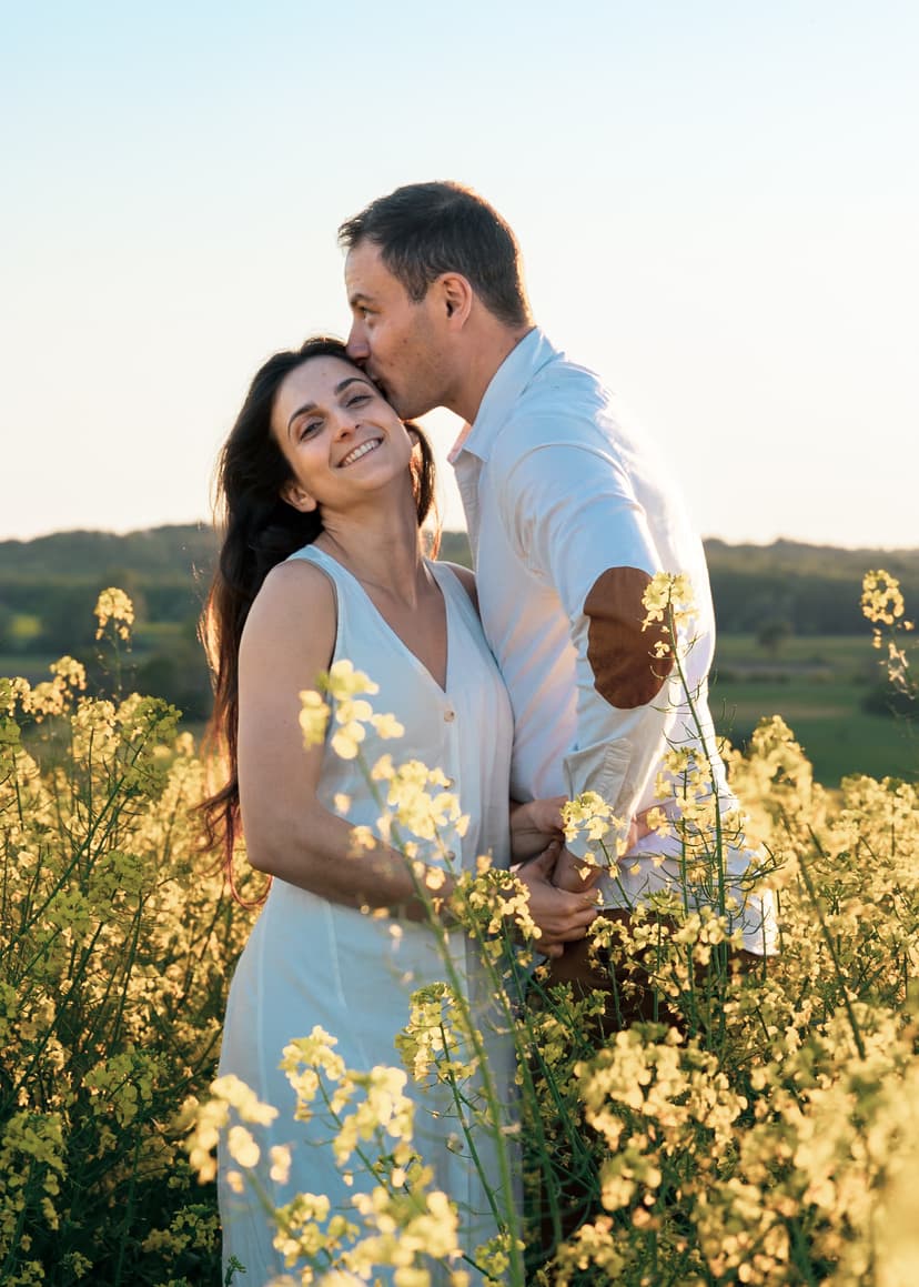 A couple standing in a field