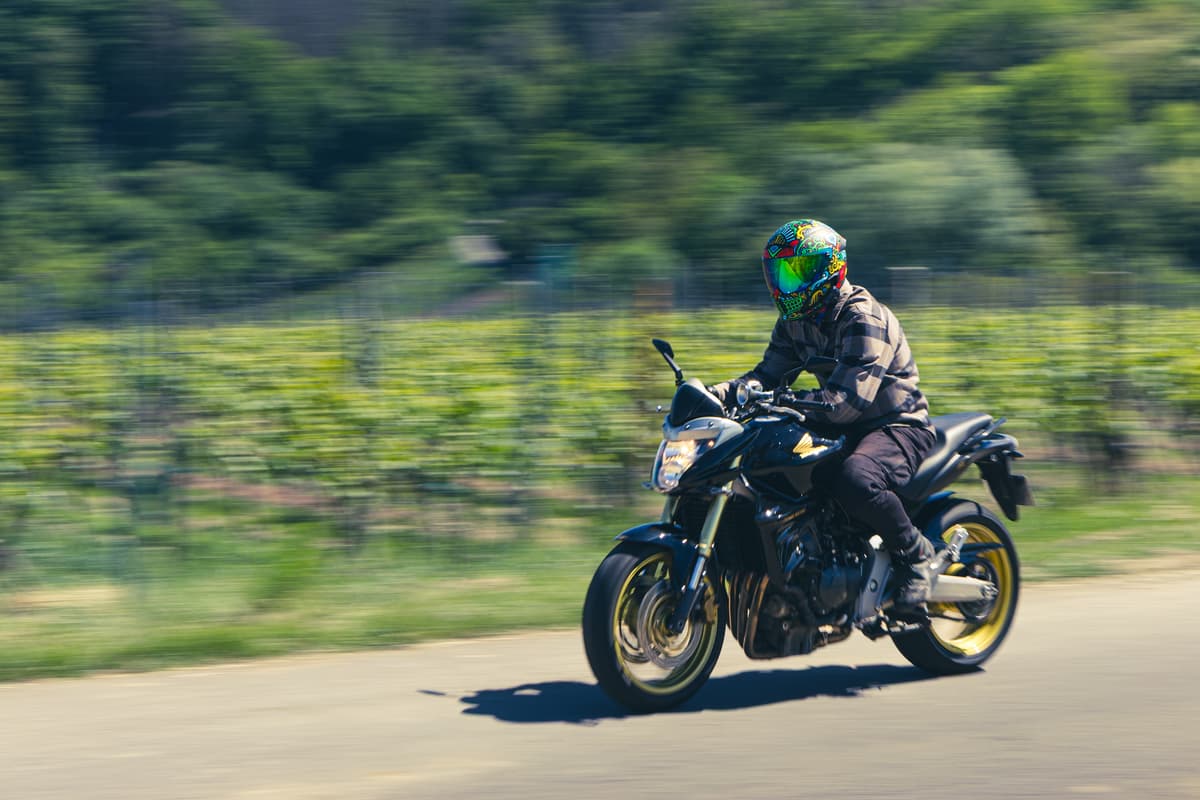 A man riding a motobike